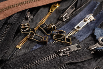 Pack a lot of black brown metal brass zippers stripes with sliders pattern for handmade sewing...