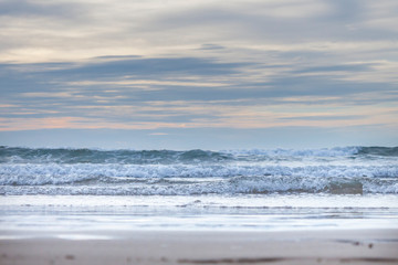 Obraz na płótnie Canvas Sea waves approaching to the beach shore