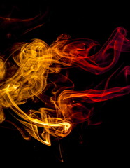 Colored smoke on black background
