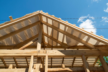 gable roof frame of wooden rafters and beams