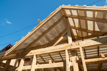 rafters and beams in the construction of the roof frame