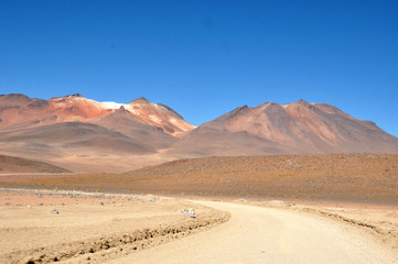 travelling through the andean mountains in bolivia, peru and chile to geysers, lagunas, la paz, city,