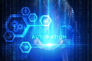 Fototapeta premium The concept of business, technology, the Internet and the network. A young entrepreneur working on a virtual screen of the future and sees the inscription: Automation