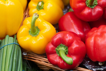 Group of delicious and fresh Capsicums  red, yellow and orange pepper vegetables on a fruit market