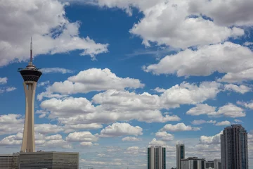 Fotobehang Las Vegas skyscrappers against blue sky with clouds background, Nevada USA © Rawf8