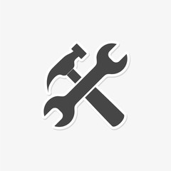 Wrench and hammer sticker isolated on white background. Symbol of repair tool kit