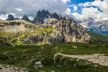 clouds over mountain trail in Dolomites