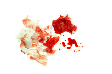 Used crumpled tissue paper bloody at white background