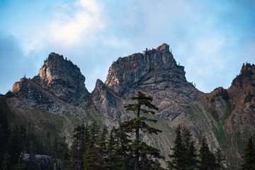 Jagged mountain peaks at sunrise in the Alpine Lake Wilderness. Central Cascade mountain range, Washington State, July 2019. Hibox Mountain.