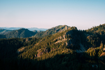 Sunrise over Rachel Lake in the Alpine Lakes Wilderness. Central Cascade Mountain Range, Washington State, July 2019.