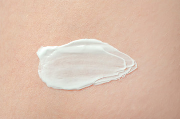 smear cream on body skin background