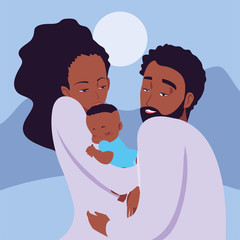 mom and dad carrying her newborn