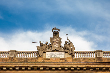 Obraz premium Details of the facade of the Complex of San Firenze a beautiful 17th century Baroque style building in Florence