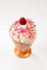 Ice cream with raspberries on a white background.  Copy space.