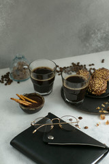 cup of coffee with cookies and sugar