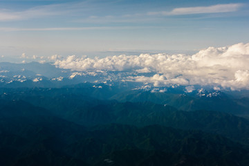 Western Washington coast seen from airplane, Puget Sound featured. Seattle in background.