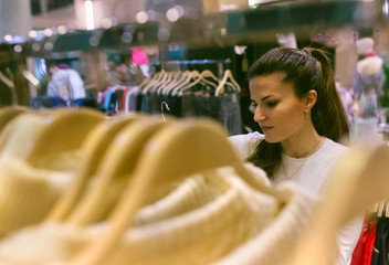Woman shopping for clothes in a vintage boutique