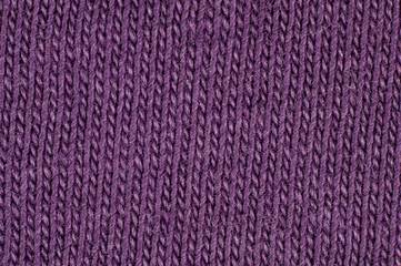 Purple fabric from thin threads close-up macro shot