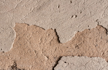 Old cob wall with cracked surface