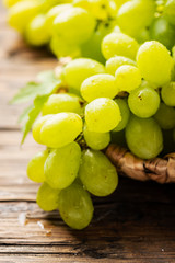Sweet yellow grape with leaves