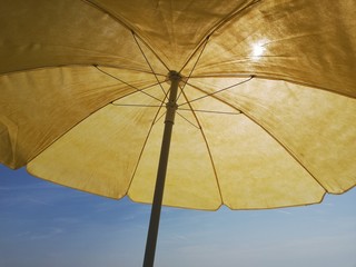yellow umbrella on white background