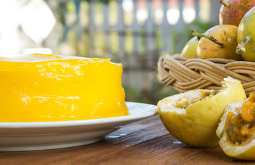 Passion fruit cake on wood background.