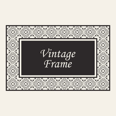 Vintage ornate border frame with ornamental elements, calligraphy swirls and ornament. Can be used for retro invitations and royal certificates.