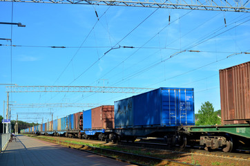 Freight train, transportation of railway cars by cargo containers shipping. Railway logistics concept - Image