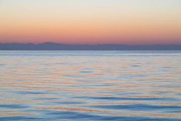 Fototapeta na wymiar Pink sunset on the sea 
