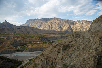 Photo of picturesque mountain area, blue sky with clouds