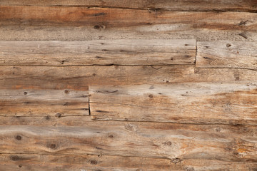 Naklejka premium Textured brown old wooden plank background. Texture.
