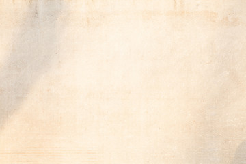 Texture of old grey concrete wall. Abstract light background gray. Texture with shadow, scratches and cracks.