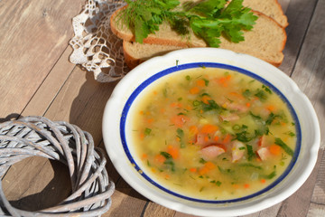 Rustic Nordic Pea Soup on vintage table in village