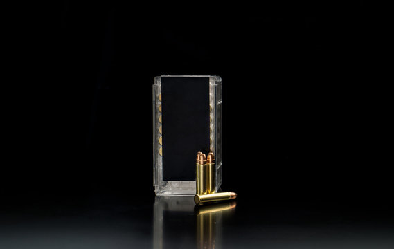 .22LR cartridge gun on dark background