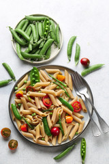Spring penne with asparagus, cherry tomatoes and green pea