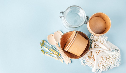 Top view of eco tableware on light blue background