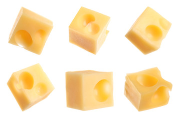 Set of delicious cheese cubes on white background