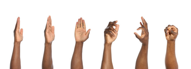 African-American man extending hand for shake on white background, closeup