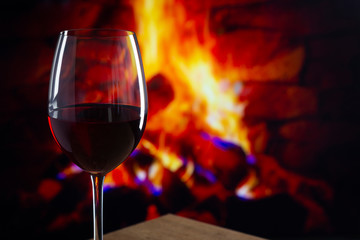 Glass of Wine in front of a fireplace