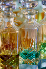 Glass perfume bottles based oils. A Bazaar, market. Aroma oils, oil perfume in faceted glass vessels.