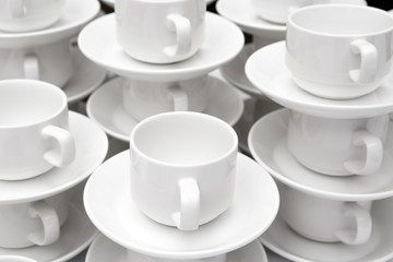 A pyramid of coffee mugs
