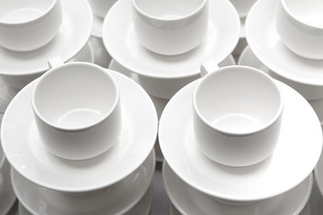 A pyramid of coffee mugs