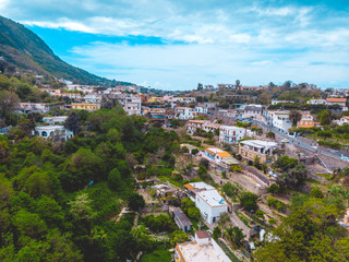 buildings in the mountains at ischia island from the drone view