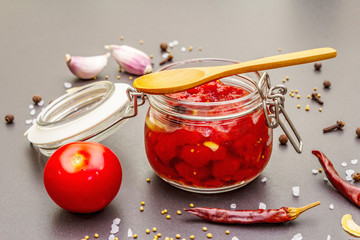 Tomato confiture, jam, chutney, sauce. Homemade preservation concept