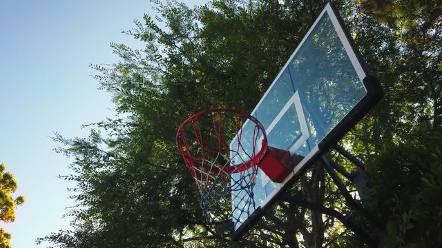 A quick jump shot from mid range sinks into the basket. Shot at 4k 60fps.
