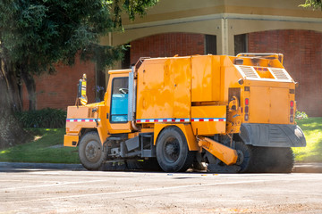Street sweeping machine operating in South San Francisco bay area