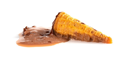 melted chocolate ice cream cone on white background