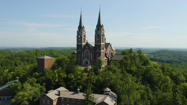 Holy Hill National Shrine of Mary, Wisconsin, USA, aerial rigt to left track to elevated view drone footage.