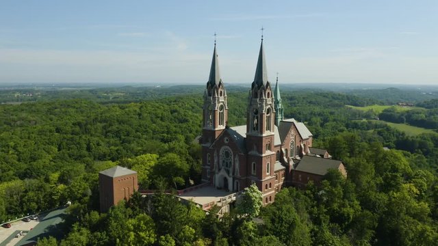 Holy Hill National Shrine of Mary, Wisconsin, USA, aerial view with reverse flight pull out drone footage.