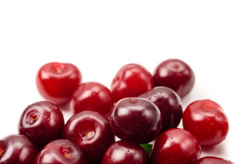 Ripe juicy cherry on white background.